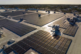 Solar panels on a manufacturing facility for sustainable energy use
