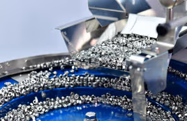 Metal parts being sorted