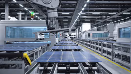 Solar panels being assembled in a manufacturing facility
