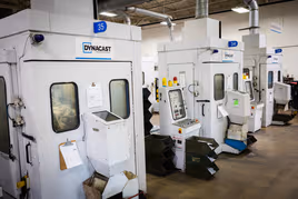 Two Dynacast machines with the operating panel