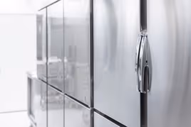 Metal refrigerator with die cast metal cooling parts