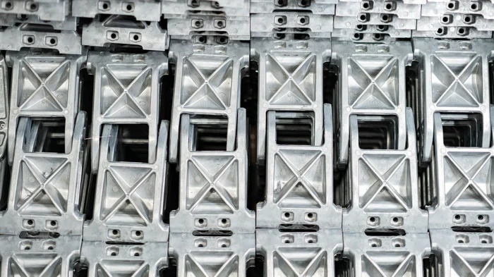 Metal die casted parts stacked in a shipping container